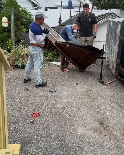 Shed & Deck Demolition crew loading items