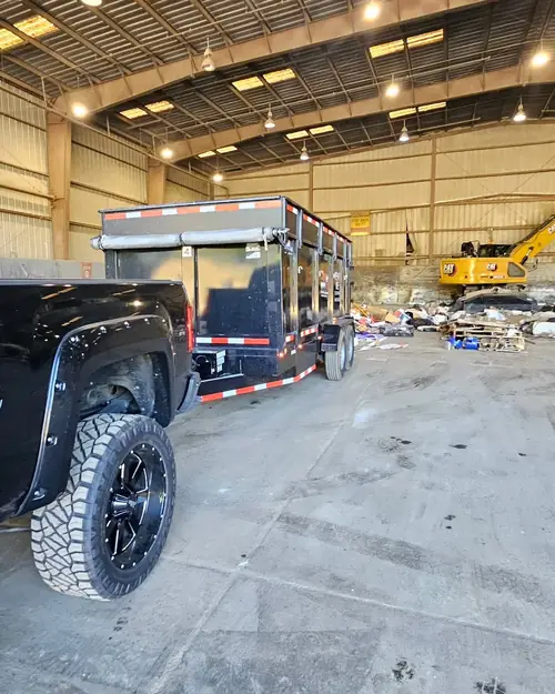 Dumpster Rental crew loading items