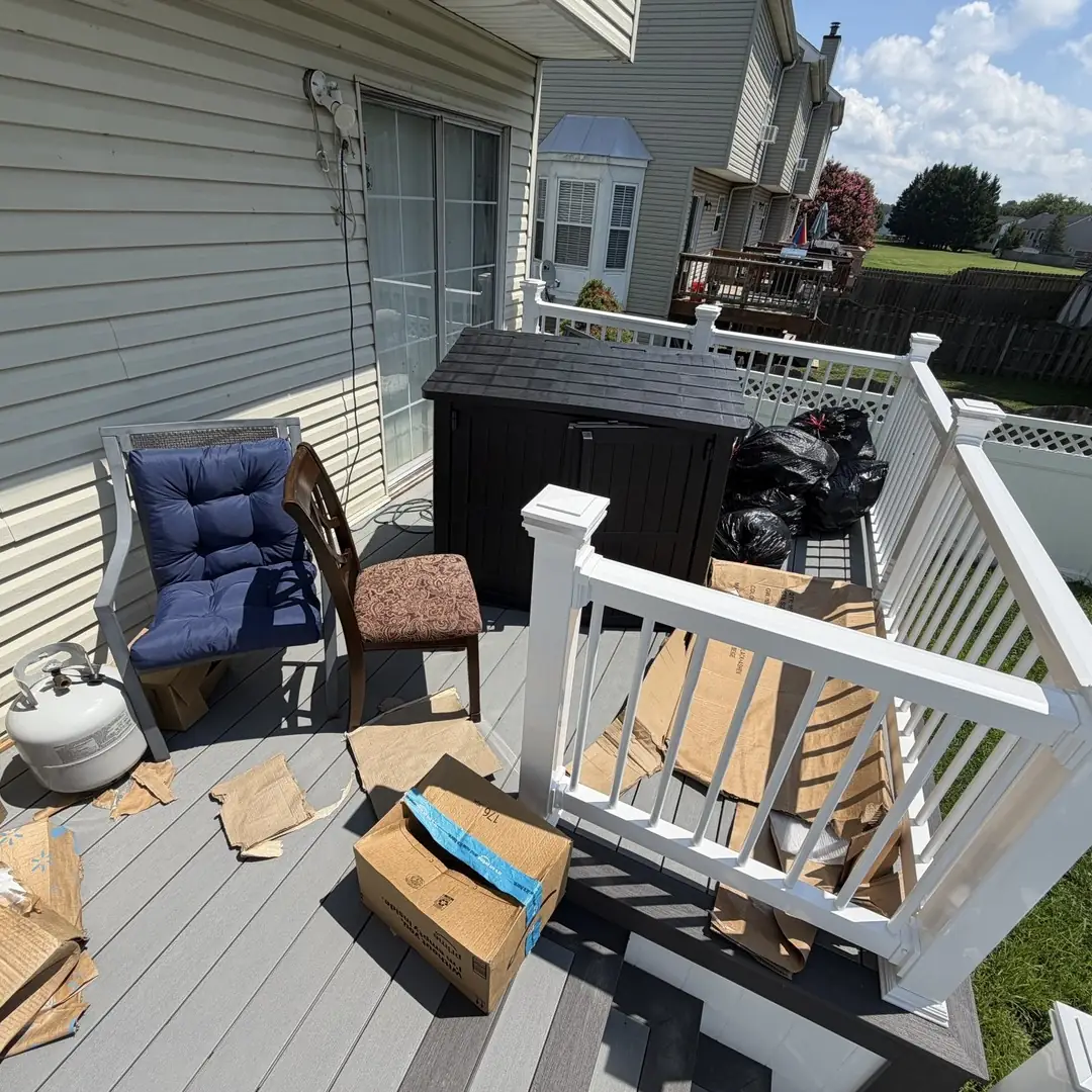 old patio furniture on deck before removal in Valrico FL
